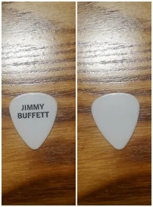 Jimmy Buffett 1996 Banana Wind tour black on white band logo Guitar Pick Pic - Picture 1 of 3