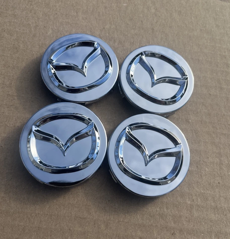 SET OF 4 MAZDA Silver CENTER WHEEL CAPS CHROME EMBLEM 56MM HUB CAP LOGO - Image 1 of 4