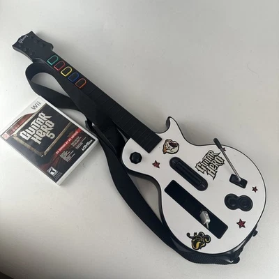 Pacchetto Nintendo Wii Guitar Hero 5 gioco e Gibson Les Paul con cinturino testato  - Immagine 1 di 4
