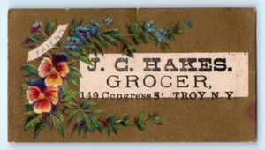 J.C. Hakes Grocer of Trot, NY Victorian Friend Trade Card Forget Me Nots Flowers - Picture 1 of 2