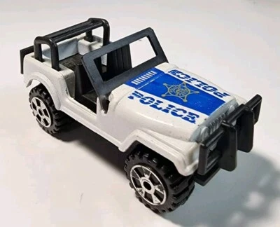 Jeep CJ-7 1/64 blanco diecast/plástico policía vintage sin marca Foto 1 de 4