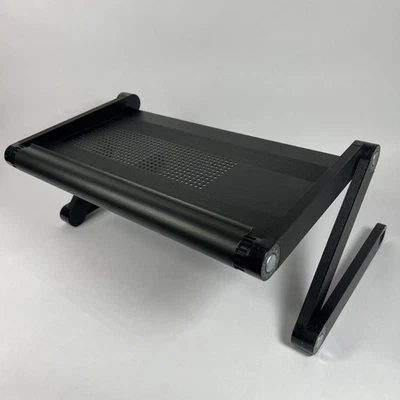 Uncaged Ergonomics Adjustable Laptop Stand Folding Portable Desk Ventilated Stan - Image 1 of 4