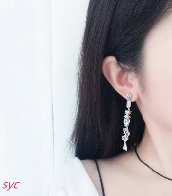 New Gema teardrop shaped earrings with asymmetric design mixed cut long rhodium - Image 1 of 4