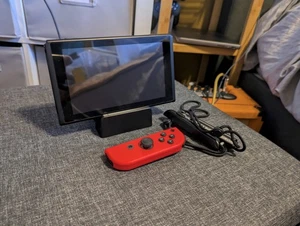 Low Serial Nintendo Switch (cant play online) with Mini dock and One Joycon READ - Picture 1 of 3
