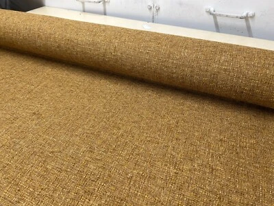 Plain upholstery material  Textured boucle by  Next fabrics 140 cms wide gold - Image 1 of 4
