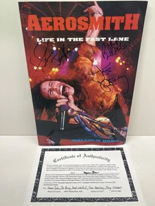 Libro AEROSMITH autografiado por los 5 miembros LIFE IN THE FAST LANE CON CERTIFICADO DE AUTENTICIDAD - Imagen 1 de 19