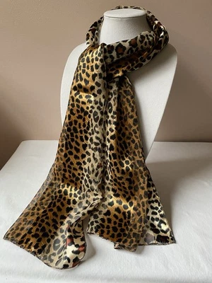 Bufanda larga brillante dorada, beige y negra con estampado de leopardo Foto 1 de 4