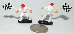 Very Small Micro Machine Figure of a Race Flagman with Checkered Flag