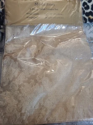 Medallion, New, in orginal packaging 8 piece table linen set, Gold - Image 1 of 4