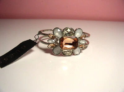 Brazalete Pulsera Guess Plata Grande Rosa Piedra Centro Flor Blanco y Cristal Alrededor Foto 1 de 3