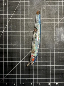 Señuelo holográfico de agua salada vintage Bomber Long A Mark Sosin 7" espalda azul - Raro - Imagen 1 de 9