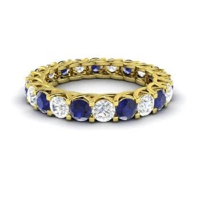 Banda de eternidad de diamantes y zafiros naturales de corte redondo de 2,64 quilates de oro amarillo de 14 quilates 7,8 Foto 1 de 4