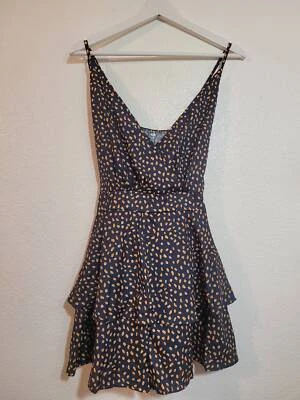 Mameluco a lunares cruzado talla M lazos en la espalda con correas ajustables azul dorado Foto 1 de 4