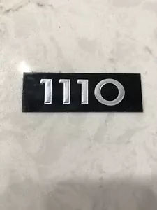 INTERNATIONAL 69-75 PICKUP & TRAVELALL, "1110" EMBLEM NOS - Picture 1 of 1