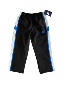 Nike Track Pants Boys 4 Black / Photo Blue LINED Athletic Wind Side Pockets NWT - Picture 1 of 3