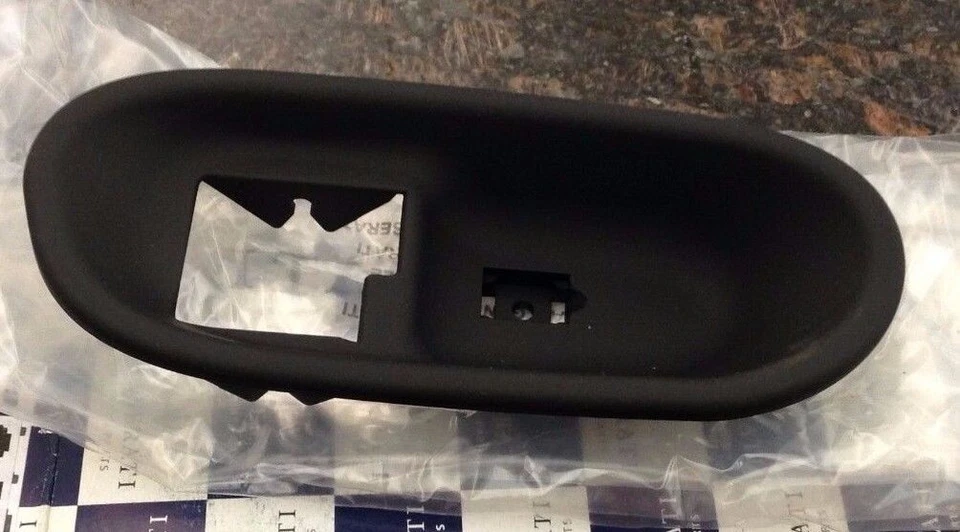 2002-05 MASERATI SPYDER GRANSPORT LH INTERIOR DOOR HANDLE PLASTIC ESCUTCHEON - Image 1 of 1