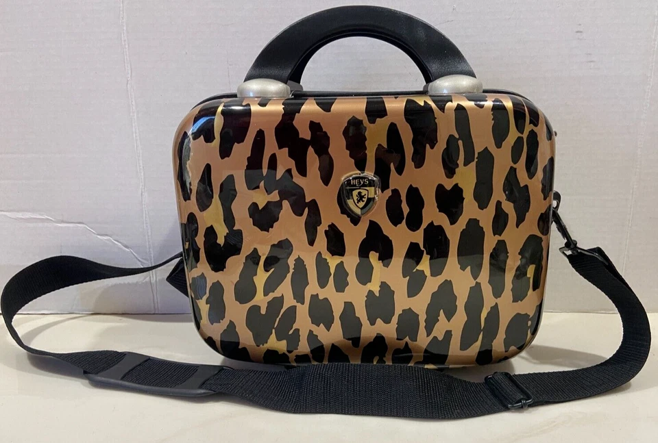 "Estuche rígido cosmético con estampado de guepardo Heys metálico 12"" X 9""" Foto 1 de 3