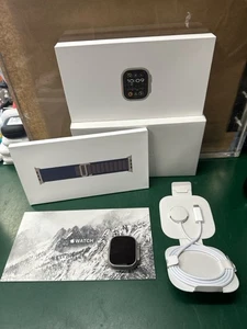 Apple Watch Ultra 2 49mm Titan mit blauem Alpine Loop Band MREK3LW/A (E10044805) - Bild 1 von 6