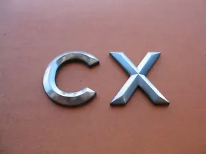 02 03 04 05 06 EMBLEMA TRASERO PLATA BUICK RENDEZVOUS CX LOGOTIPO INSIGNIA SÍMBOLO #2 - Imagen 1 de 2