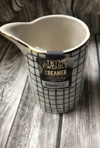 Beccuccio per crema da tavolo e timo plaid bordo nero bianco oro mix fiammifero - Foto 1 di 4