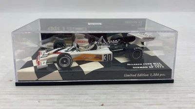 MIN530734331 Minichamps McLaren Ford M23 J.Ickx German GP 1973 1/43, teca  - Immagine 1 di 2