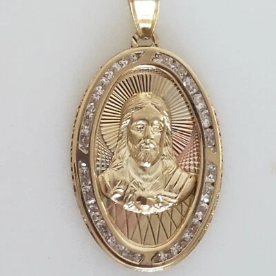 Real 14k gold Jesus charm 1.50 inch oval diamond cut - Image 1 of 4