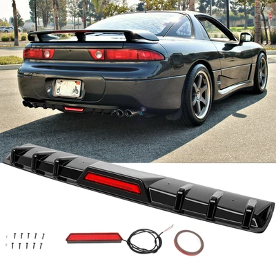 Parachoques trasero difusor alerón labio negro brillante para Mitsubishi 3000GT con luz LED Foto 1 de 4