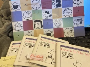 LOVE IS IN THE AIR (PASSIONATE PEANUTS) By Charles M. Schulz - Hardcover NEW - Picture 1 of 5