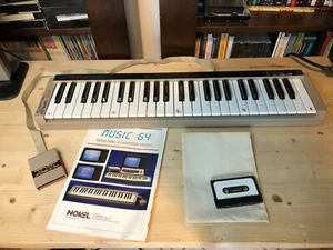 NOVEL MUSIC 64 per COMMODORE 64 - Tastiera musicale con manuale e cassetta - C64 - Bild 1 von 16