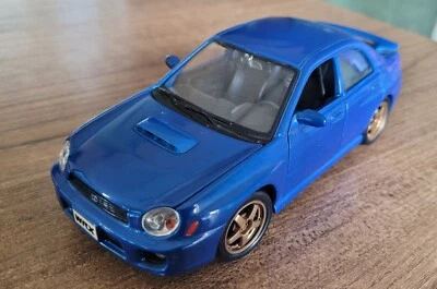 MODELLINO AUTO SUBARU IMPREZA WRX MAISTO - SCALA 1:24 - Immagine 1 di 3