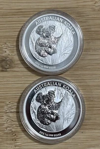 Dos monedas de $1 koala australiano 2013-P de 1 troy oz.999 de plata fina en cápsula - Imagen 1 de 2