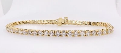 Brazalete de tenis redondo brillante de diamantes cultivados en laboratorio de 5,5 quilates de oro amarillo de 14 quilates Foto 1 de 4