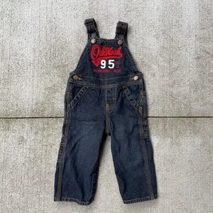 Mono con tirantes Oshkosh B’gosh para niños pequeños - lavado oscuro - equipo de ingenieros - 12 meses - Imagen 1 de 7