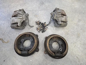 98-02 Firebird Trans Am Camaro Z28 LS1 Rear Disc Brake Backing Plates & Calipers - Picture 1 of 6