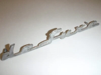 Front Fender Script Emblem " deLuxe " 52 53 54 Henry J 1952 1953 1954 # 213714 - Image 1 of 4