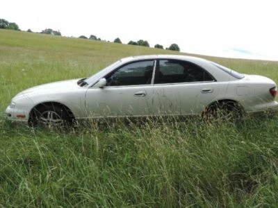 ONE Mazda Millennia front bumper insert foglight bezel trim fog light OEM 1999 Foto 1 de 3