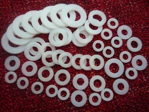 RONDELLE IN NYLON FORMA BIANCA PIATTE 66 M2 2,5 M3 3,5 M4 M5 M6 M7 M8 M10 M12 14 16 20 - Foto 1 di 4