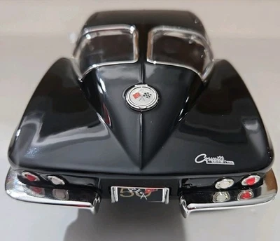 Chevrolet Corvette Sting Ray FI 1963 1:18 ERTL cupé ventana dividida ruedas personalizadas Foto 1 de 4