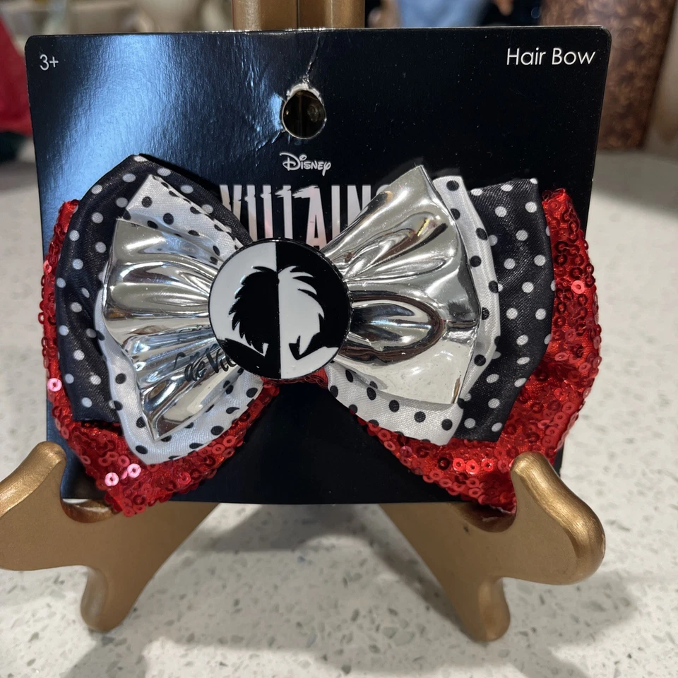 Disney Villanos Cruella De Vil 101 Dalmations Pelo Moño Disfraz Juegos con disfraces Nuevo Diablo Foto 1 de 4