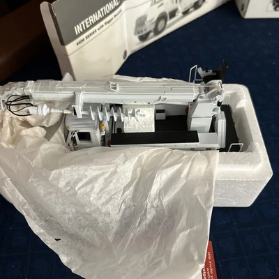 1/34 International 4400 Series with Digger Derrick AEP Electric - Image 1 of 4