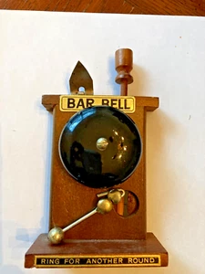 Campanello da bar "Anello per un altro tondo" con apribottiglie Ballantine conico - Foto 1 di 4