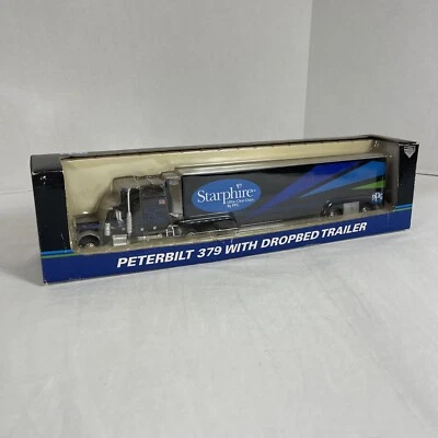 SpecCast 32905 PPG Starphire 1:64 Peterbilt 379 W/ Dropbed Trailer Die Cast - Image 1 of 4