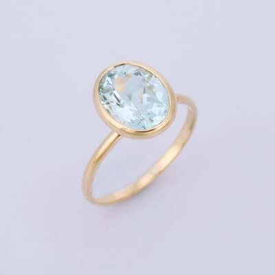 Ювелирные изделия для женщин кольцо с одним аквамарином из розового золота 18 карат с безелем - Изображение 1 из 4
