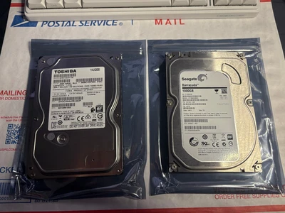 Toshiba DT01ACA100 1 TB  and Seagate ST1000DM003  1TB  3.5" SATA III Desktop HDD - Image 1 of 4