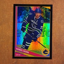 3-05-30 . 2013-14 opc o-pee-chee black rainbow /100 #267 daniel sedin (A)