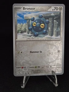 Bronzor Reverse Holo NM 066/131 SV: Prismatic Evolutions Pokemon - Picture 1 of 3
