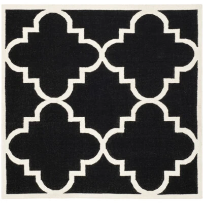 SAFAVIEH Dhurries DHU633A Handwoven Black / Ivory Rug - Image 1 of 4