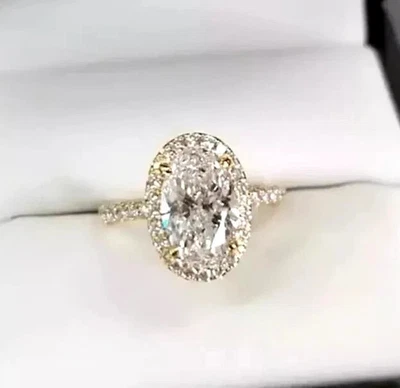 Anillo de compromiso de boda de diamantes de corte ovalado de 4 quilates enchapado en oro amarillo de 14 k Foto 1 de 4