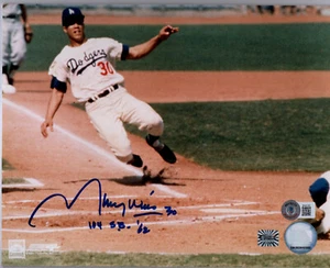 MAURY WILLS SIGNED AUTOGRAPHED 8x10 PHOTO LOS ANGELES DODGERS LEGEND BECKETT BAS - Picture 1 of 3