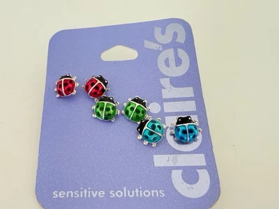 NWT’S CLAIRE'S LOT OF 3 RED, GREEN, BLUE ENAMEL LADYBUG PIERCED EARRINGS 527 - Image 1 of 4